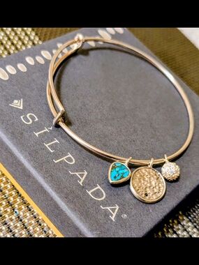 Silpada (B3212) Sterling Silver Bracelet with Gorgeous Charms